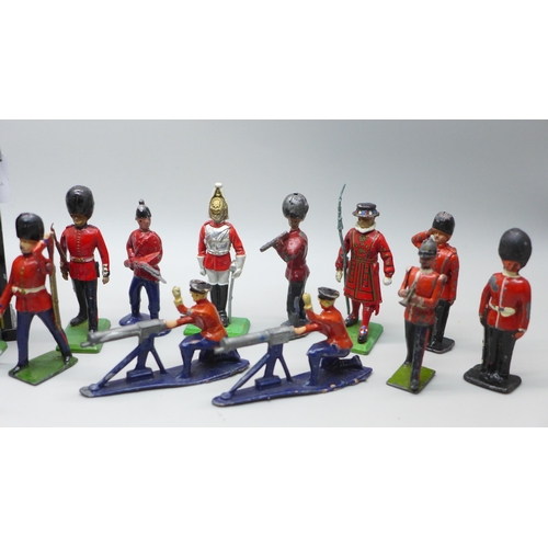 2033 - A collection of mainly Britains model soldiers, a sentry box and two del Prado figures, 24 pieces in... 