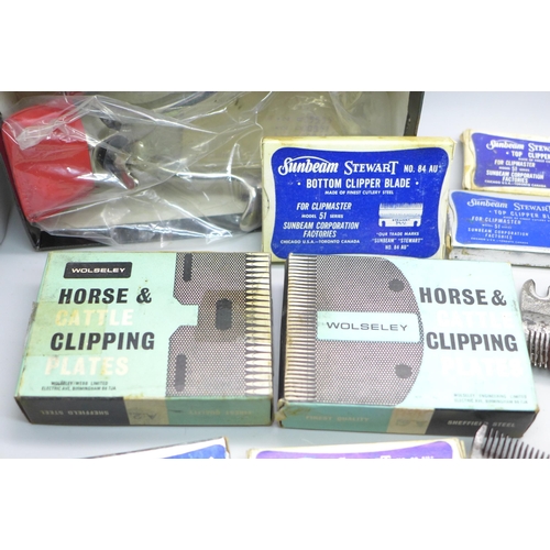 2036 - A collection of vintage clipper blades, horse and cattle clipping plates, most boxed including Sunbe... 