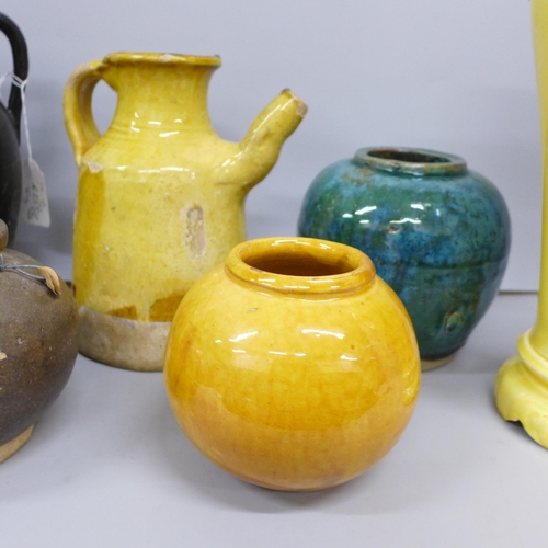 2044 - A Japanese blackware jug, a/f, a similar jug in yellow glaze, yellow and green glaze vases and three... 