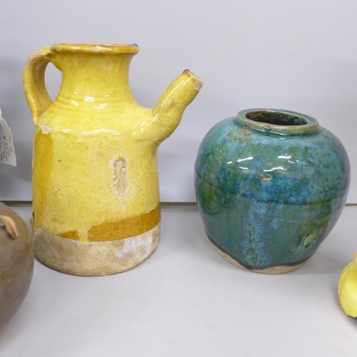 2044 - A Japanese blackware jug, a/f, a similar jug in yellow glaze, yellow and green glaze vases and three... 