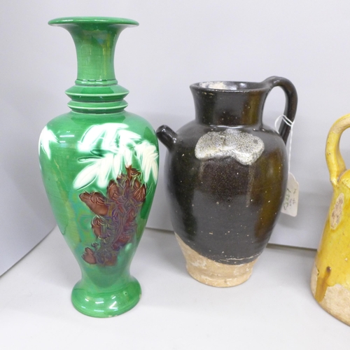 2044 - A Japanese blackware jug, a/f, a similar jug in yellow glaze, yellow and green glaze vases and three... 