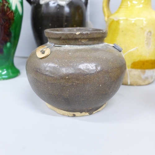 2044 - A Japanese blackware jug, a/f, a similar jug in yellow glaze, yellow and green glaze vases and three... 