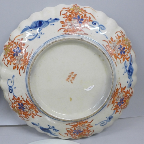 2052 - Four Imari plates including one shell shaped, a/f