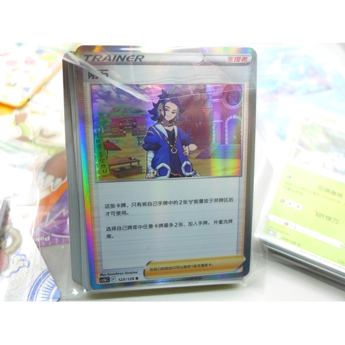 2054 - A collection of Japanese Pokémon cards, some shiny and stickers, also some Topps Hero Attax