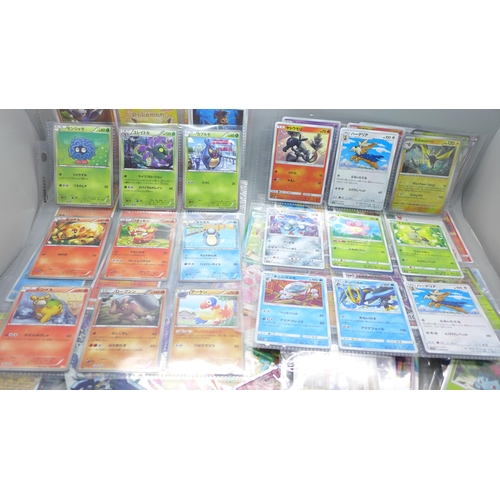 2054 - A collection of Japanese Pokémon cards, some shiny and stickers, also some Topps Hero Attax