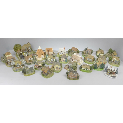 2056 - A collection of twenty-six Danbury Mint cottages