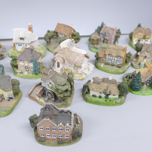 2056 - A collection of twenty-six Danbury Mint cottages