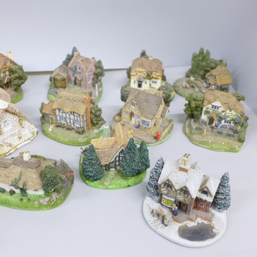 2056 - A collection of twenty-six Danbury Mint cottages