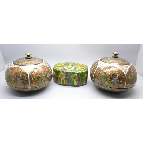 2057 - A pair of papier-mache decorated circular boxes and one other marked hand made in Kashmir