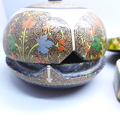 2057 - A pair of papier-mache decorated circular boxes and one other marked hand made in Kashmir