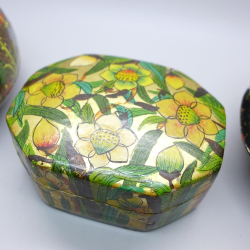 2057 - A pair of papier-mache decorated circular boxes and one other marked hand made in Kashmir