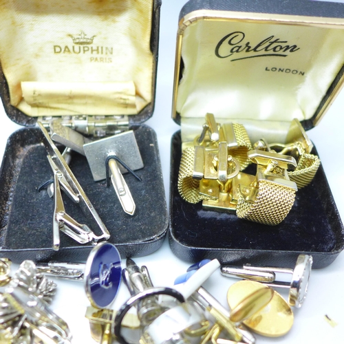 2058 - A large collection of cufflinks and tie-pins