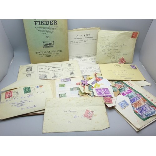 2061 - A small collection of loose stamps and collectors books