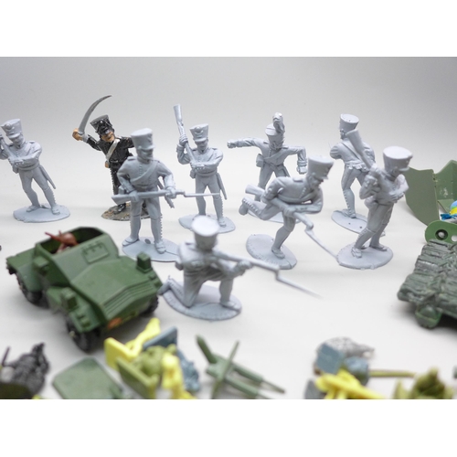 2063 - A collection of toy soldier figures, etc.