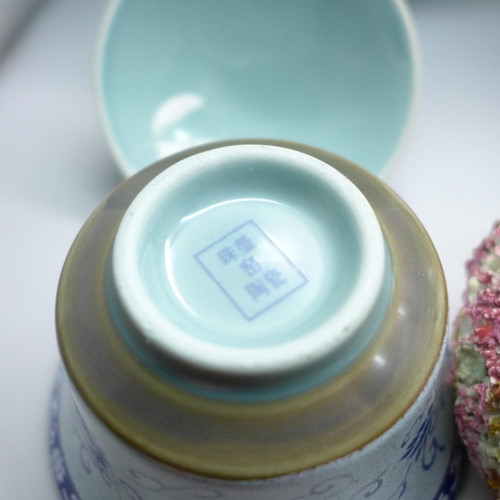 2069 - A 19th Century Staffordshire pen holder in the form of a birds nest, a blue bowl with ribbed detail,... 