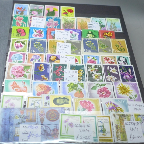 2080 - Stamps; Flowers and orchids thematic stamp collection housed in a large 60 sided padded stock book w... 