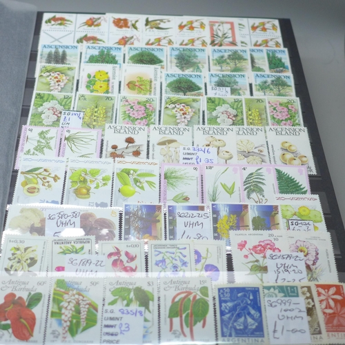 2080 - Stamps; Flowers and orchids thematic stamp collection housed in a large 60 sided padded stock book w... 