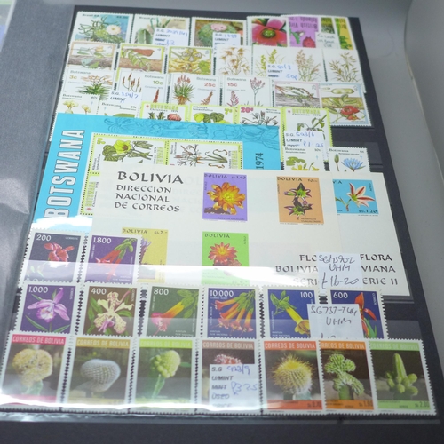 2080 - Stamps; Flowers and orchids thematic stamp collection housed in a large 60 sided padded stock book w... 