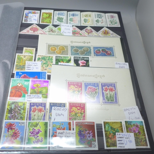 2080 - Stamps; Flowers and orchids thematic stamp collection housed in a large 60 sided padded stock book w... 