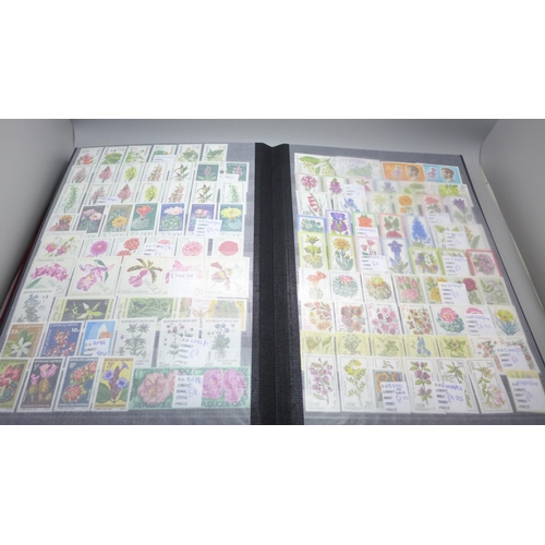 2080 - Stamps; Flowers and orchids thematic stamp collection housed in a large 60 sided padded stock book w... 