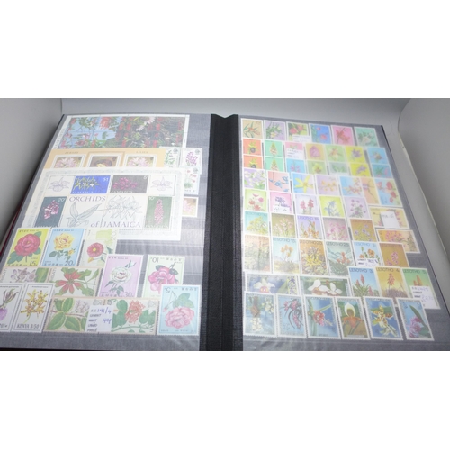 2080 - Stamps; Flowers and orchids thematic stamp collection housed in a large 60 sided padded stock book w... 