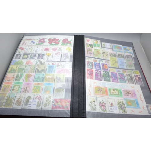 2080 - Stamps; Flowers and orchids thematic stamp collection housed in a large 60 sided padded stock book w... 