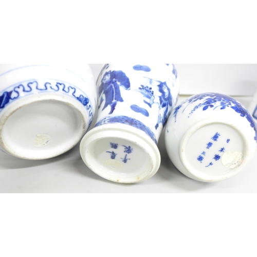 2081 - A collection of blue and white porcelain, includes three vases with character marks, large vase with... 