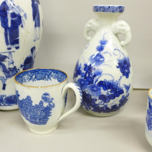 2081 - A collection of blue and white porcelain, includes three vases with character marks, large vase with... 