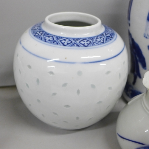 2081 - A collection of blue and white porcelain, includes three vases with character marks, large vase with... 