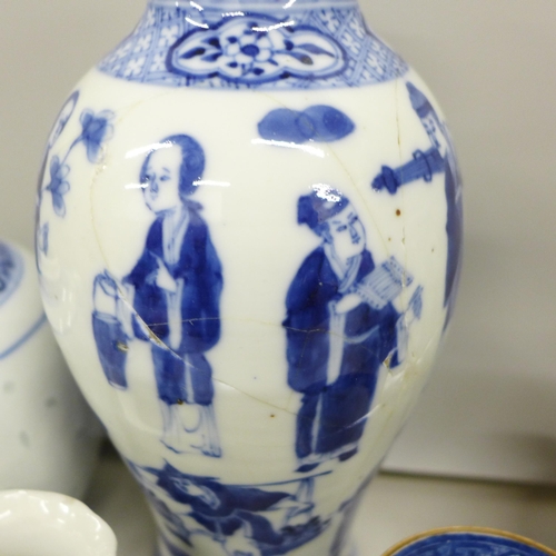 2081 - A collection of blue and white porcelain, includes three vases with character marks, large vase with... 