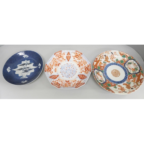 2090 - A collection of oriental pottery, includes a charger and five dishes, charger a/f, large blue dish a... 