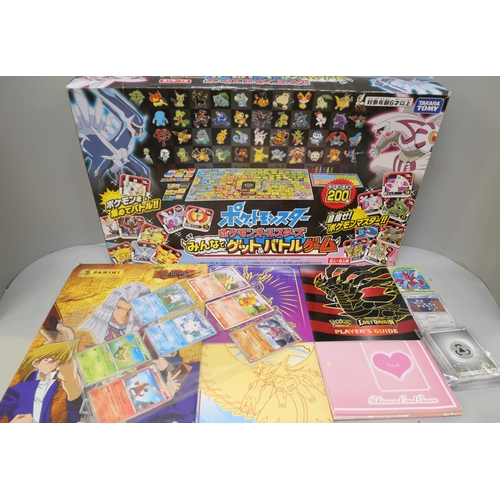 2103 - Two Pokémon board games, Jumbo cards, Play mats, Battle Spirits cards, etc.