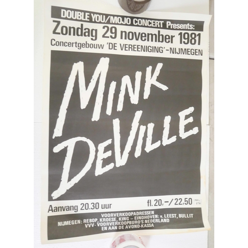 2113 - A collection of four 1980s pop music concert posters including Level 42 and Frank Miller.