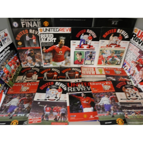 2117 - Football memorabilia; a box of Chelsea v Manchester United programmes from the 1960s onwards, includ... 