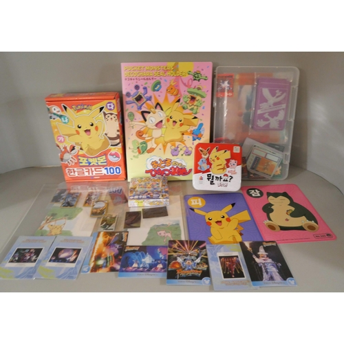 2118 - A collection of Pokémon cards, stickers, jumbo cards, etc.