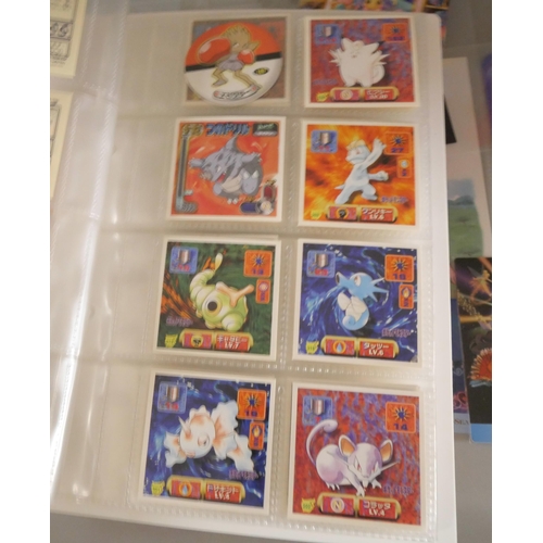 2118 - A collection of Pokémon cards, stickers, jumbo cards, etc.