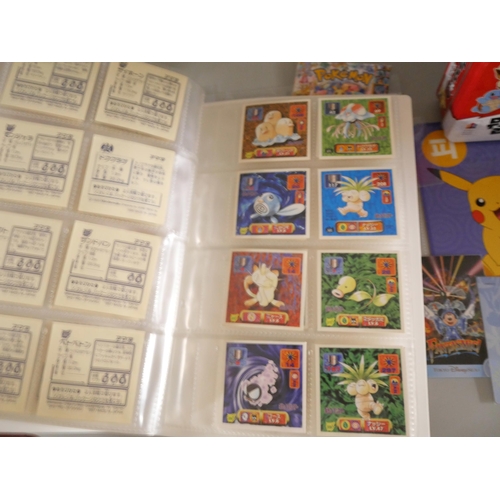 2118 - A collection of Pokémon cards, stickers, jumbo cards, etc.