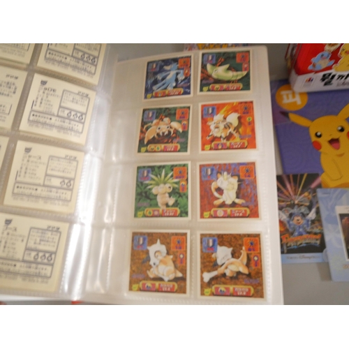 2118 - A collection of Pokémon cards, stickers, jumbo cards, etc.