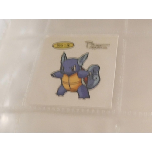 2118 - A collection of Pokémon cards, stickers, jumbo cards, etc.