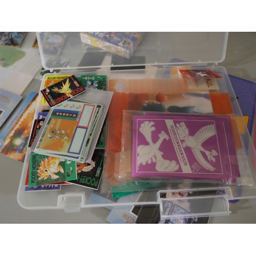 2118 - A collection of Pokémon cards, stickers, jumbo cards, etc.