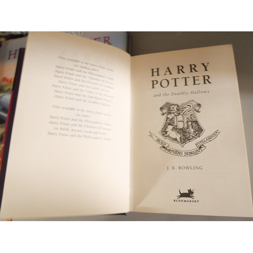 2120 - Harry Potter; A set of four large hardback editions of J.K. Rowling Harry Potter books illustrated b... 