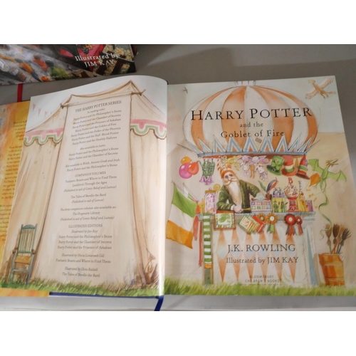 2120 - Harry Potter; A set of four large hardback editions of J.K. Rowling Harry Potter books illustrated b... 