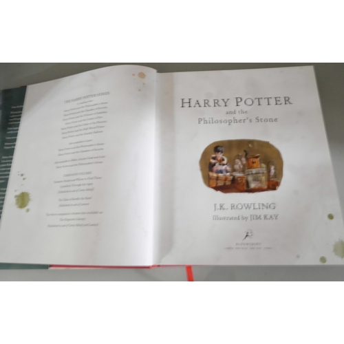 2120 - Harry Potter; A set of four large hardback editions of J.K. Rowling Harry Potter books illustrated b... 