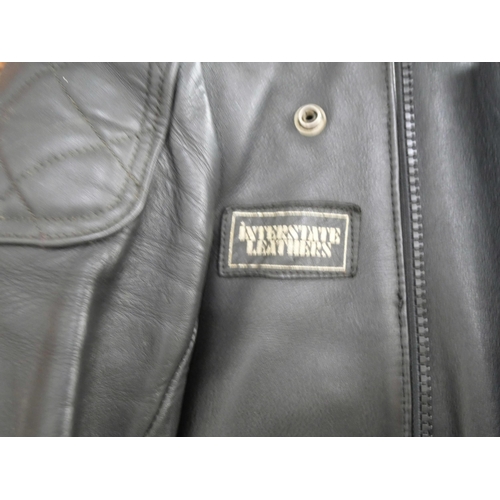 2133 - A black Interstate Leathers motorcycle jacket and trousers. Jacket labelled 36