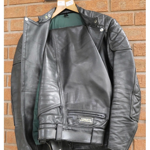 2133 - A black Interstate Leathers motorcycle jacket and trousers. Jacket labelled 36