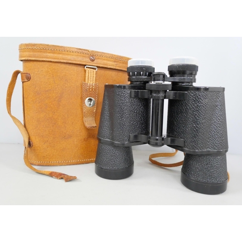 2142 - A pair of Zodiac 10 x 50 binoculars S23-6411 No. 115201, in leather case.