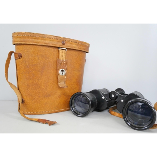 2142 - A pair of Zodiac 10 x 50 binoculars S23-6411 No. 115201, in leather case.