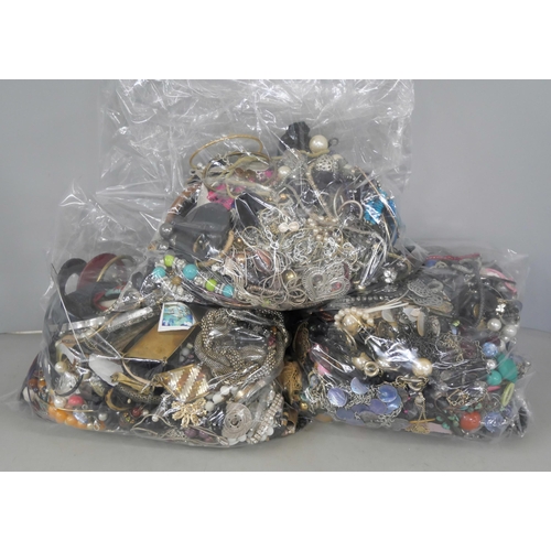 2143 - Three bags of costume jewellery including necklaces, bangles, bracelets, brooches and other.