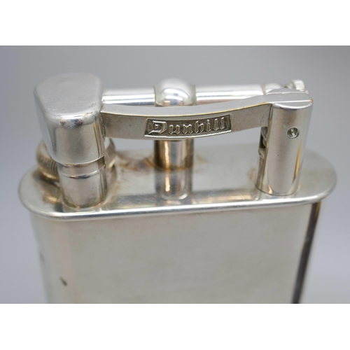 2165 - A large Dunhill table lighter, 10cm, and one other Dunhill lighter *THIS LOT IS NOT AVAILABLE FOR PA... 