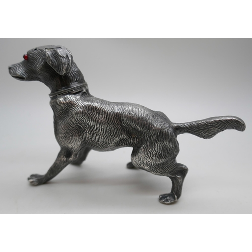 2166 - A spelter pounce pot in the form of a dog